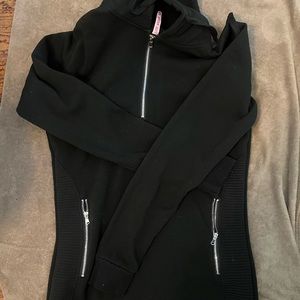 Black zipper hoodie. Can be worn with tights or as a hoodie dress.